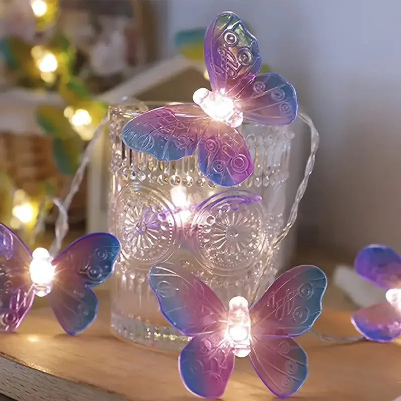 Détail papillons lumineux violet en PVC