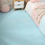Tapis mousse puzzle bleu clair, idéal pour un espace de jeu lumineux et apaisant.