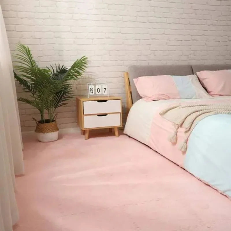 Tapis mousse puzzle rose clair, parfait pour l'éveil et la sécurité des tout-petits.