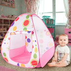 Tente de jeu pliable rose pour enfant, un abri doux et féerique.