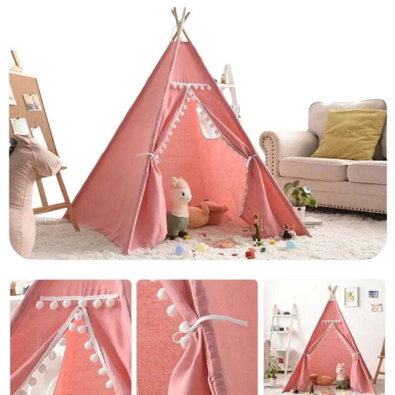 Tipi enfant d'intérieur rose avec pompons décoratifs, parfait pour un coin lecture stylé.